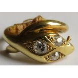 18 carat gold serpent head ring set with three graduated diamonds, the round cut diamonds