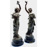 After Francois Moreau - a pair of French spelter figures of robed women 'Musique' and 'Chanson' each