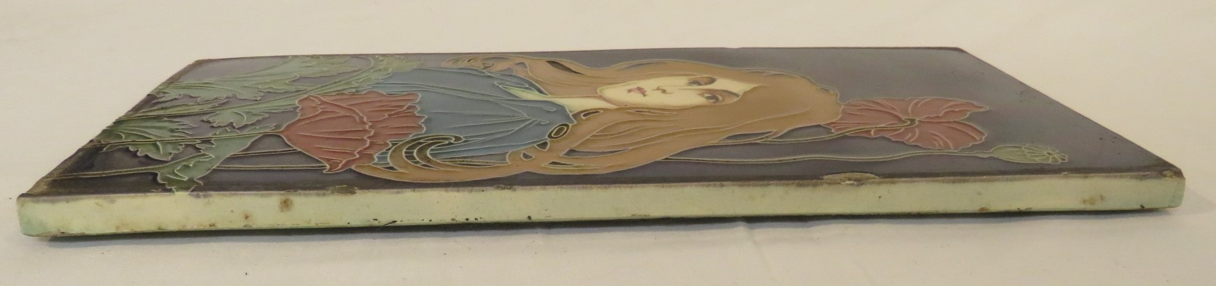 An Art Nouveau ceramic tile by Carl Sigmund Luber, depicting head and shoulders of woman in blue - Image 7 of 14