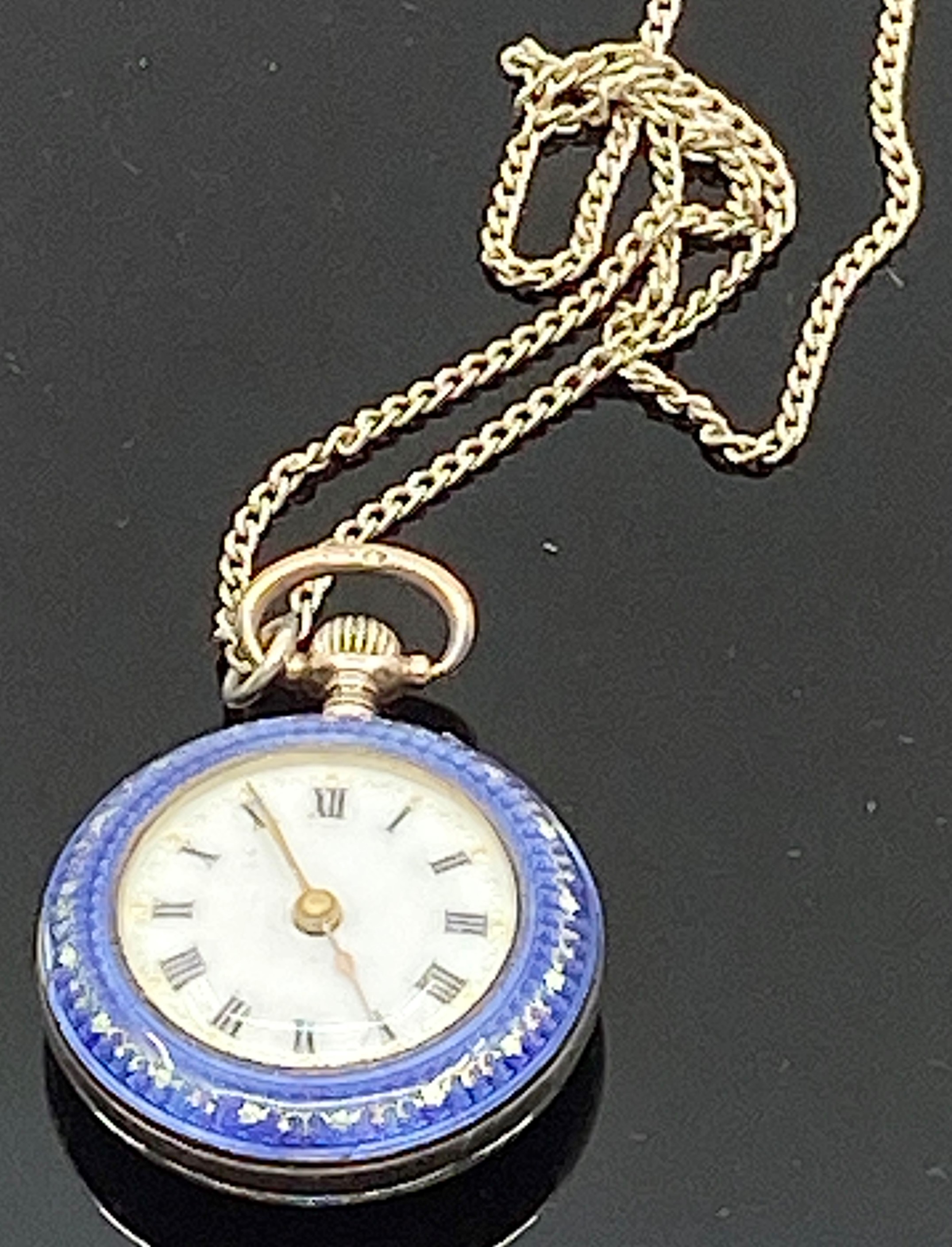 An early 20th century imported silver lady's fob watch with blue enamel and gilt case, crown - Image 2 of 3