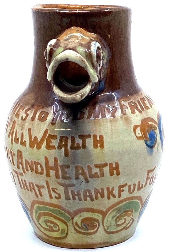 Baron Ware Barnstaple pottery motto jug with fish head spout and fish tail handle, "GOOD WISHES TO - Image 3 of 4