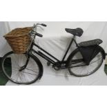 Hercules lady's black bicycle with three-speed gears and wicker basket