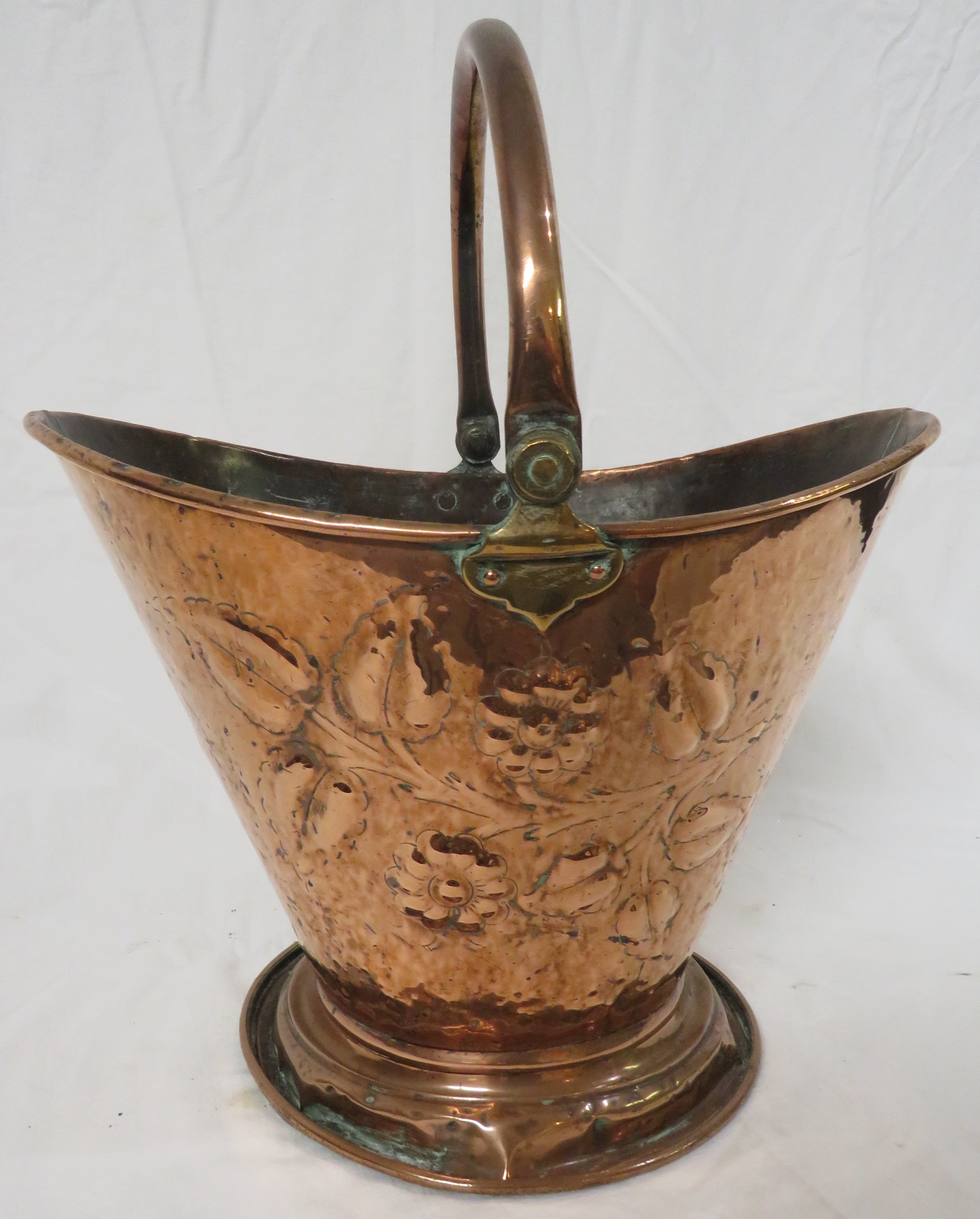 Art Nouveau copper coal bucket of cowl shape on a circular foot with hinged handle, the sides with - Image 3 of 4