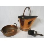 Large Victorian copper coal bucket on oval foot, with hinged handle and a handle to the back (height