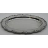 Oval white metal tray with a moulded foliate scrolled border, stamped STERLING 925 CAMUSSO MADE IN