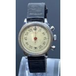 A military 1/5 second wrist stopwatch, the back marked PATT. 3169 3897 STAINLESS STEEL BACK BREVETTE