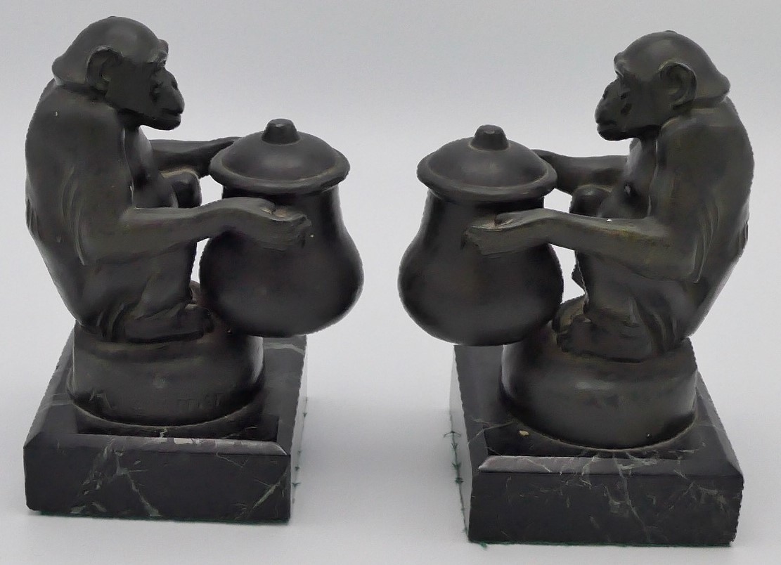 Max Le Verrier (1891-1973) - a pair of bronze bookends modelled as seated chimpanzees each holding a - Image 3 of 6