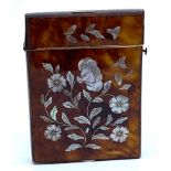 Edwardian card case clad in tortoiseshell and decorated to both sides in inlaid mother of pearl with