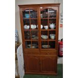 CHINESE STYLE HARDWOOD DISPLAY CABINET, UPPER SECTION WITH TWO GLAZED DOORS, TWO CENTRAL DRAWERS AND