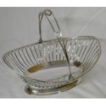 Silver-plated oval basket with hinged handle, the bowl with wire looped sides, on an oval pierced