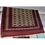 RED GROUND FLOOR RUG WITH MULTIPLE MEDALLIONS