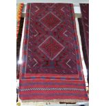 RED GROUND HAND KNOTTED FLOOR RUNNER WITH FIVE MEDALLIONS 233CM X 60CM