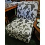 CONTEMPORARY CHAIR UPHOLSTERED IN BUTTERFLY PRINT FABRIC