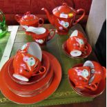 CHINESE CERAMIC SIX SETTING TEA SERVICE DECORATED WITH TULIPS