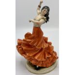 Capodimonte figure 'The Spanish Dancer' designed by Falchi, on oval base with gilding, impressed