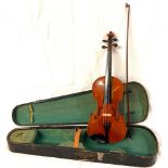 A Violin with a printed paper label within 'Antonius Stradiuarius Cremonensis non Faciebat Anno