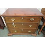 Georgian mahogany chest of three graduated drawers, the drawer fronts with brass handles on