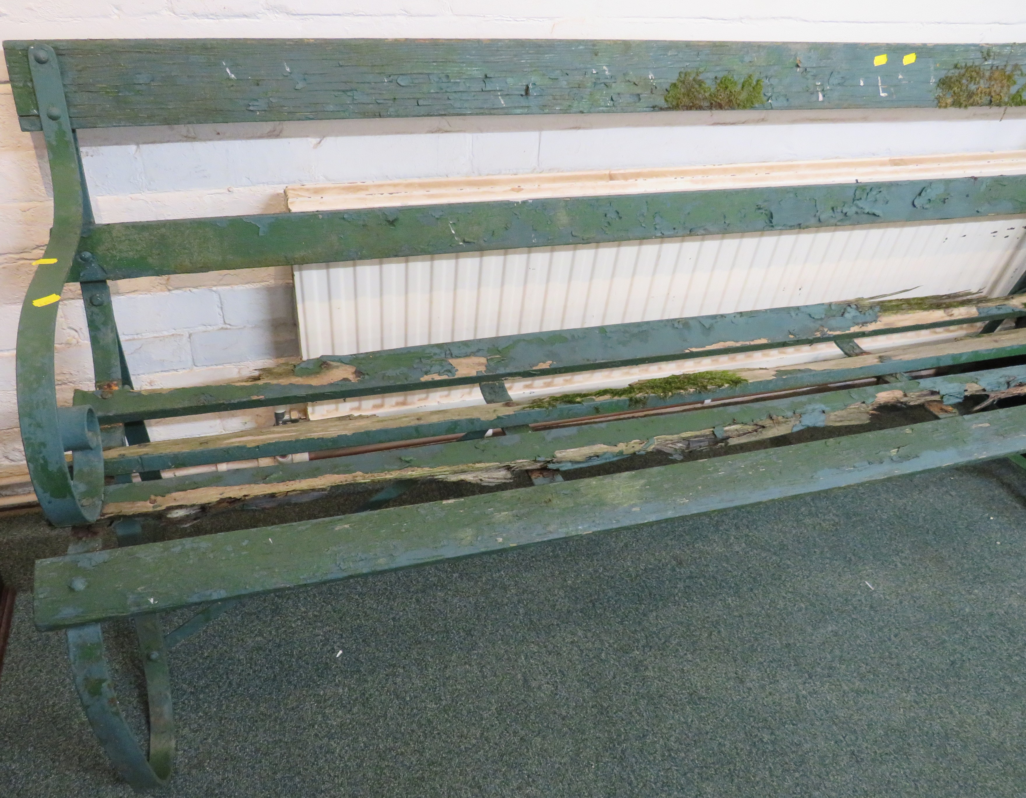 A wooden slatted garden bench with scrolled wrought metal ends, painted green, height 80cm, length - Image 2 of 4