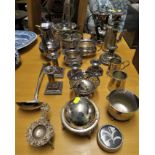 SILVER PLATED WARE INCLUDING TEAPOTS, CANDLESTICKS, LADLE, ETC