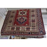 RED AND BEIGE GROUND RECTANGULAR GEOMETRIC PATTERN WOVEN FLOOR RUG