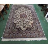 BEIGE GROUND FLORAL PATTERNED RUG