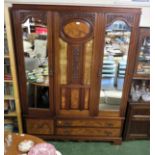 LARGE MAHOGANY TWO DOOR WARDROBE WITH CARVED GLAZED CENTRAL PANEL AND THREE DRAWERS TO BASE
