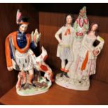 STAFFORDSHIRE POTTERY FLATBACK FIGURE OF HUNTER WITH DOG (A/F) AND FLATBACK FIGURE OF LADY AND GENT