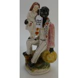 Uncle Tom Staffordshire figure, earlier figure, man with girl on knee 27cm.