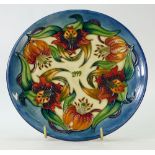 Moorcroft 1999 year plate decorated in the tiger lily design,