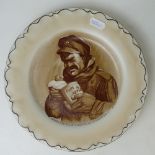 Grimwades pottery plate "A memento of the great war" depicting a soldier eating plum & apple "when