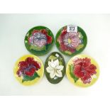 A collection of Walter Moorcroft dishes in the anemone and hibiscus designs (5)