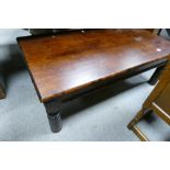 Large reproduction mahogany coffee table with brass bounding detail