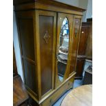 Victorian paneled wardrobe with a single oval mirrored door