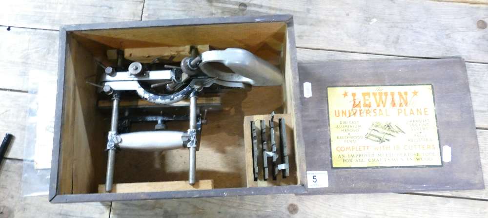 A vintage Lewin Universal Plane, with original box and manually (missing one cutter,