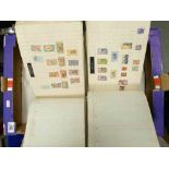 Two large albums containing extensive world selection of both mint & used stamps.