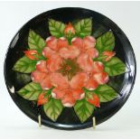 Moorcroft 1991 year plate decorated in the tudor rose design,