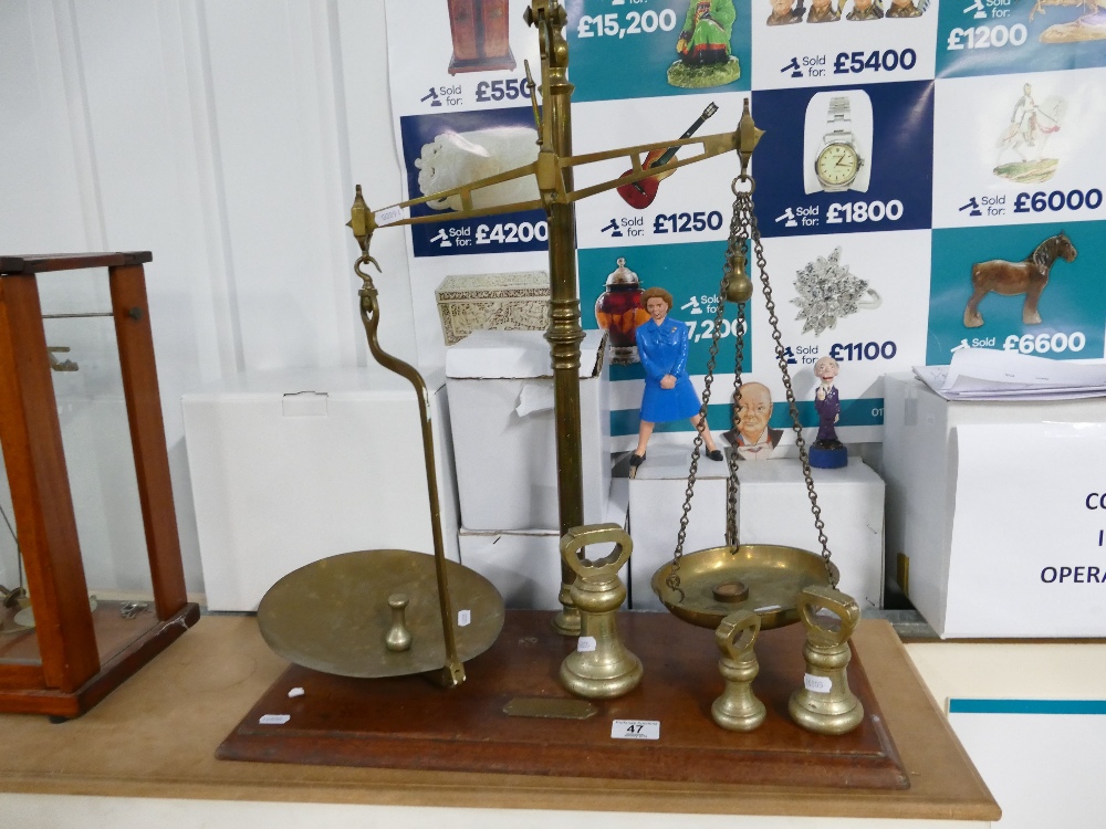 Set of brass weighing scales marked - 'Cooperative Wholesale Society Limited'