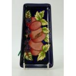 Moorcroft oblong tray decorated in the peaches and berries design,