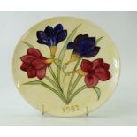 Moorcroft 1987 year plate decorated in the freesia design,