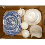 A collection of pottery including 19th century blue & white platters,
