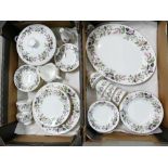 A collection of Wedgwood dinner and tea ware in the Hathaway rose design (2 trays,