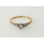 18ct yellow gold & platinum solitaire diamond ring (15 pts appx.), set 4 tiny diamonds to shoulders.