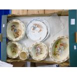 A collection of Royal Doulton bunnykins oatmeal round and oval dishes, mug,