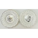 Wedgwood shaped plate decorated with silver lustred decoration of flowers,