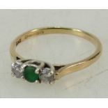 9ct gold diamond & emerald ring size N1/2. Diamonds approx 10 pts each. Weight 1.7g.