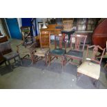 An assortment of chairs to include a pair of pierced split back Georgian Mahogany dining chairs,