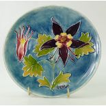 Moorcroft 1984 year plate decorated in the columbine design,