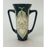 Moorcroft two handled vase decorated in the snow drop design, made for collectors club 1995,