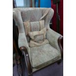 Mahogony framed upholstered wing back arm chair