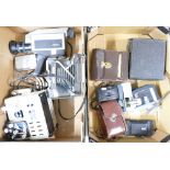 A collection of vintage camera and movie equipment including projector,